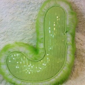 Justice "J" throw pillow.